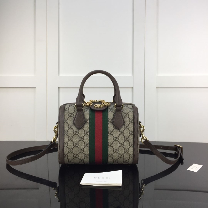 G*u*i top handle bags